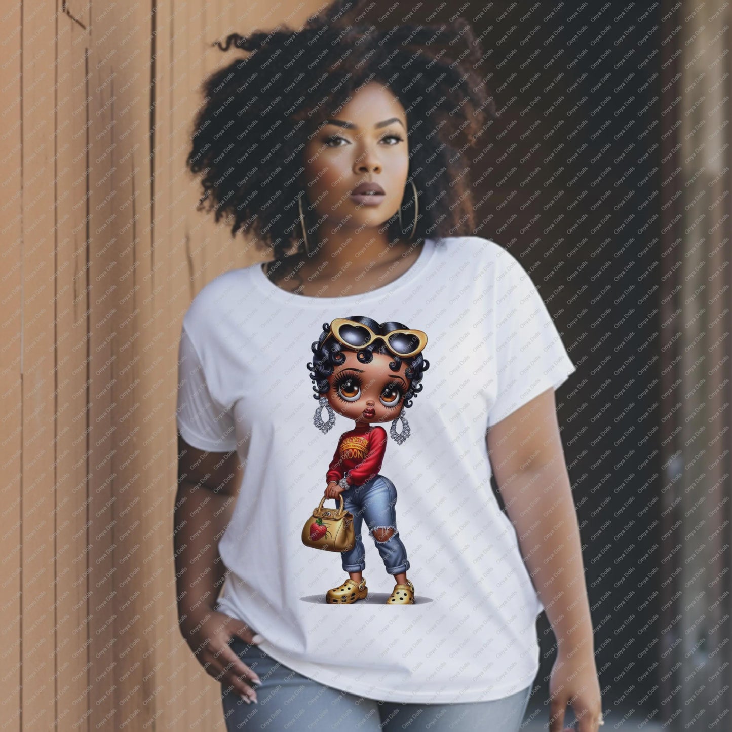 Woman wearing a white t-shirt with a cartoon character design.