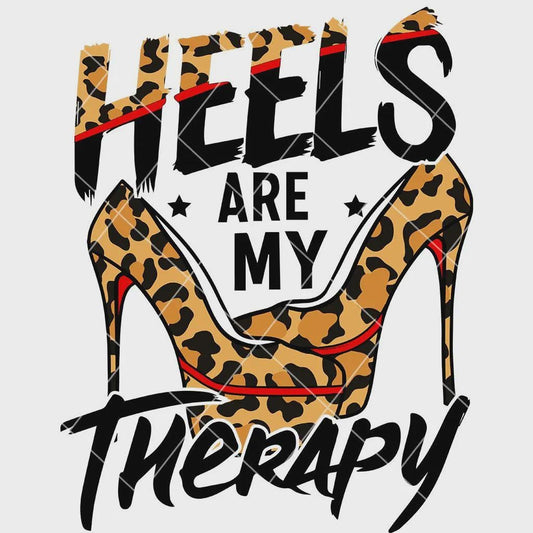 Leopard print high heels with text 'HEELS ARE MY THERAPY' on a light gray background